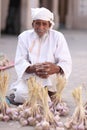 Omani salesman with traditional clothing Royalty Free Stock Photo