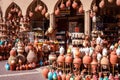 Omani Souvenirs. Hand Made Pottery in Nizwa Market. Clay Jars at the Rural Traditional Arabic Bazaar, Oman. Arabian Peninsula.