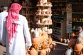 Omani Souvenirs. Hand Made Pottery in Nizwa Market. Clay Jars at the Rural Traditional Arabic Bazaar, Oman. Arabian Peninsula.