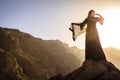 Omani woman in the mountains Royalty Free Stock Photo