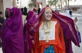 Omani woman in traditional dress, dancing