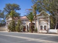 Omaruru, Namibia - July 17, 2015: Well kept historical colonial building from 1907 on empty street