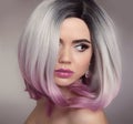 Ombre bob hairstyle blonde girl portrait. Purple makeup. Beautiful hair coloring woman. Fashion Trendy haircut. Blond model with Royalty Free Stock Photo