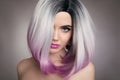 Ombre bob hairstyle blonde girl portrait. Purple makeup. Beautiful hair coloring woman. Fashion Trendy haircut. Blond model with Royalty Free Stock Photo