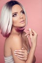 Ombre bob short hairstyle. Beautiful hair coloring woman. Manicured nails. Eye shadows makeup. Trendy haircut. Blond model with Royalty Free Stock Photo