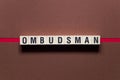 Ombudsman word concept on cubes Royalty Free Stock Photo