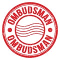 OMBUDSMAN text written on red round postal stamp sign