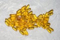 Omega3 capsules in fish shape. Royalty Free Stock Photo