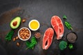 Omega-3 fats. Salmon fish and vegetarian sources of unsaturated fatty acids. Healthy food concept for good health Royalty Free Stock Photo