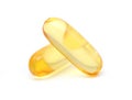 Omega 3 fish oil capsules on white background.