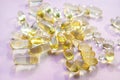 Omega 3 fish oil gel capsules, vitamin E. Close-up medicine yellow transparent pills, omega 3 fish oil capsules, vitamin Royalty Free Stock Photo