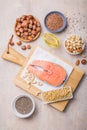 Omega 3 food sources and omega 6 on concrete background, top view copy space. Foods high in fatty acids including vegetables, Royalty Free Stock Photo