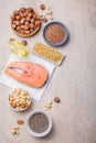 Omega 3 food sources and omega 6 on concrete background, top view copy space. Foods high in fatty acids including vegetables, Royalty Free Stock Photo