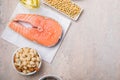 Omega 3 food sources and omega 6 on concrete background, top view copy space. Foods high in fatty acids including vegetables, Royalty Free Stock Photo