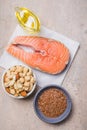 Omega 3 food sources and omega 6 on concrete background, top view copy space. Foods high in fatty acids including vegetables, Royalty Free Stock Photo