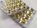 Omega 3 jelly yellow pills on white background Royalty Free Stock Photo