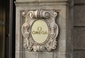 OMEGA Logo on the wall Royalty Free Stock Photo
