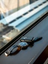 Omega Speedmaster 1866 with Volvo key fob in natural light