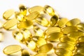 Omega 3 vitamin gel capsules or Fish Oil, Cod liver oil medicines, macro shot close-up Royalty Free Stock Photo