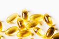 Omega 3 vitamin yellow supplement gel capsules or Fish Oil on white background, Cod liver oil medicines, top view