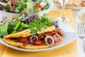 Omelet filled with chanterelle mushrooms Royalty Free Stock Photo