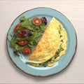 Omelet with greens close-up on a plate