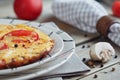 Omelet with onion, tomatoes and mushrooms