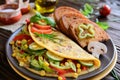 Omelet with pepper, tomato, corn, green onion, cucumber, mushrooms and fried bread Royalty Free Stock Photo