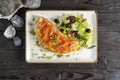 Omelet with salmon and mix salad. Royalty Free Stock Photo