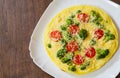 Omelet with tomato, broccoli and cheese Royalty Free Stock Photo
