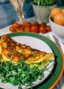 Omelete and ruccola leaves Royalty Free Stock Photo