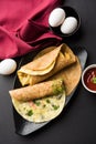 Omelette / omelette chapati roll or Indian bread or roti rolled with omlet. Royalty Free Stock Photo