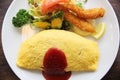 Omelette with fried rice and shrimp tempura Japanese food Royalty Free Stock Photo