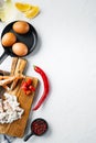 Omelette ingredients with pepper, crab meat, egg, cheese, on white background, top view flat lay , with copyspace and space for