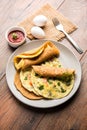 Omelette / omelette chapati roll or Indian bread or roti rolled with omlet. Royalty Free Stock Photo