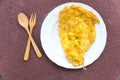 Omelette plate with wood fork and spoon Royalty Free Stock Photo