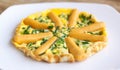 Omelette with sausages and herbs on white plate Royalty Free Stock Photo