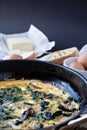 Omelette with wild mushrooms and spinach, view from above Royalty Free Stock Photo