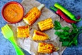 ÃÂomemade corn baked with chilli sauce. Baked corn with chili sauce. Royalty Free Stock Photo