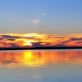 Sunset gorgeous relax beautiful calm serene wisconsin capture moment sun sunset reflection water lake fish camp travel cabin Royalty Free Stock Photo