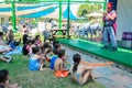 Omer (Beer-Sheva), ISRAEL -Clown speaks to kids on the summer stage near the pool, July 25, 2015 in Israel