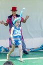 Omer (Beer-Sheva), ISRAEL -Clown and a teenage girl with inflatable ball on his head as a turban on the summer , July 25, 2015 Royalty Free Stock Photo