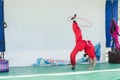 Omer (Beer-Sheva), ISRAEL - The girl in the scarlet kimono doing a handstand with a hoop - July 25, 2015