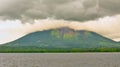 Ometepe volcano in Lake Nicaragua covered in clouds