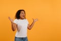 Omg. Excited Black Lady Shouting Looking Aside At Copy Space Gesturing With Hands Posing Over White Background. Studio Royalty Free Stock Photo