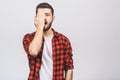 OMG! Portrait of happy glad young man shoked with great news isolated against white background Royalty Free Stock Photo