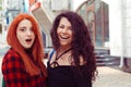 OMG, Wow. Closeup portrait two surprised girls looking at you camera discussing latest gossip news. Young shocked funny women Royalty Free Stock Photo