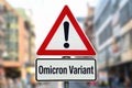 Omicron Variant at warning sign in city Royalty Free Stock Photo