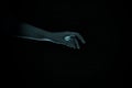 an ominous blue hand stretches out of the darkness. children`s nightmares Royalty Free Stock Photo