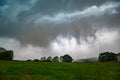 Ominous clouds with falling rain during a severe thunderstorm Royalty Free Stock Photo